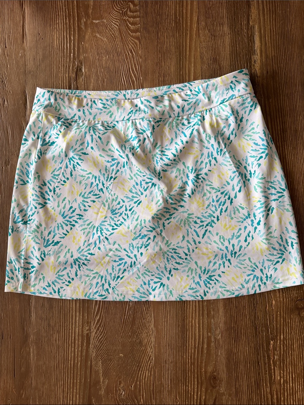 White Floral-Print Golf Skort with Teal and Yellow Accents